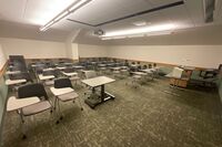 Back of room view of student tablet arm seating 