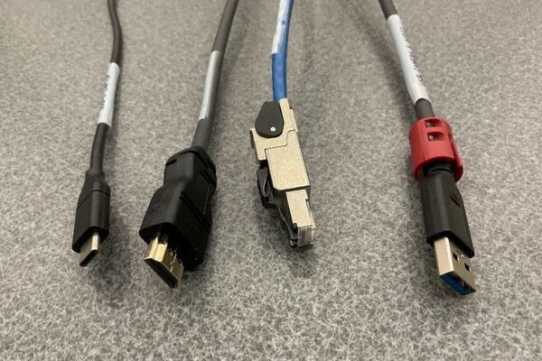 Pedestal - laptop cable connections with cables pulled out showing cable ends