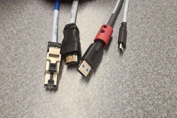 Pedestal - laptop cable connections with cables pulled out showing cable ends
