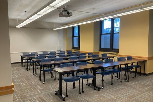 Back of room view of tables and chairs