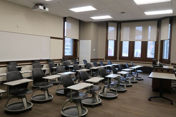 Back of room view of student tablet arm seating 