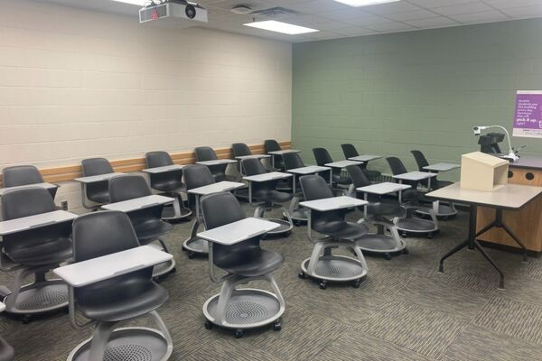 Back of room view of student tablet arm seating 