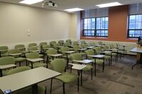 Back of room view of student tablet arm seating