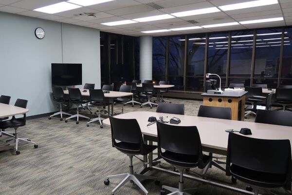 Back of room view showing collaborative table and chair group seating