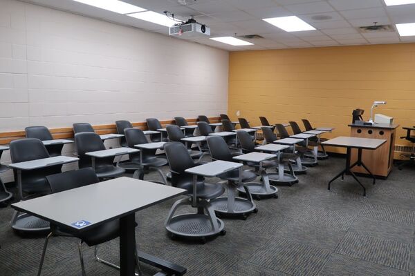 Back of room view of student tablet arm seating 