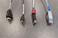 Pedestal - laptop cable connections with cables pulled out showing cable ends