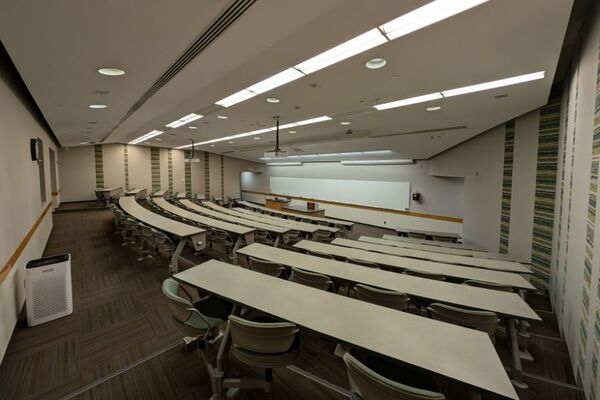 Front of room view with lectern center in front of markerboard 