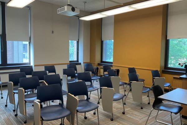 Back of room view of student tablet arm seating 