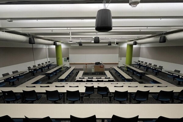 Front of room view with lectern center in front of markerboard 