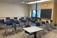 Back of room view of student tablet arm seating 