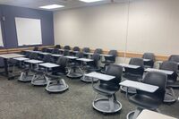 Back of room view of student tablet arm seating 