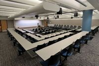 Front of room view with lectern center in front of markerboard 