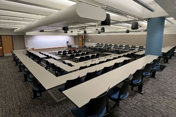 Front of room view with lectern center in front of markerboard 