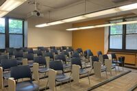 Back of room view of student tablet arm seating 