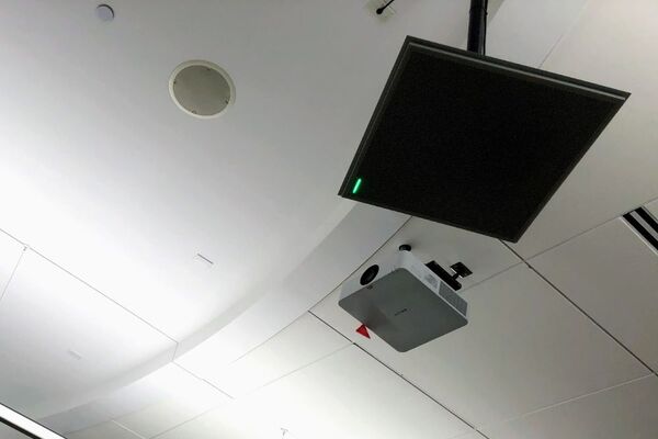 A 2¿ x 2¿ tile mounted to the ceiling to provide microphone coverage over student seating