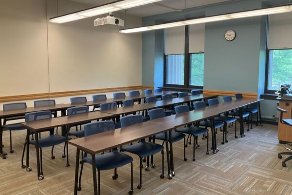 Back of room view of tables and chairs