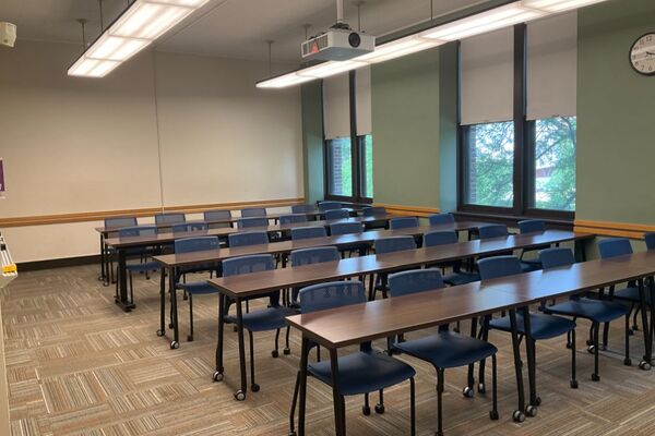 Back of room view of tables and chairs