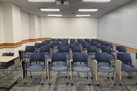 Back of room view of student tablet arm seating 