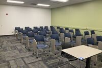 Back of room view of student tablet arm seating 