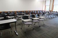 Back of room view of student tablet arm seating 