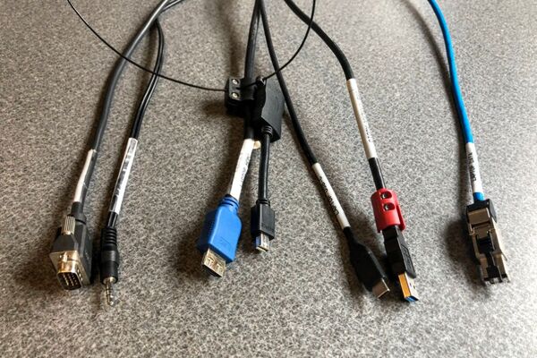 Pedestal - laptop cable connections with cables pulled out showing cable ends