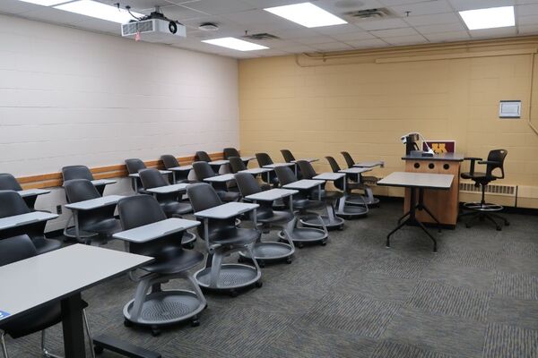 Back of room view of student tablet arm seating 