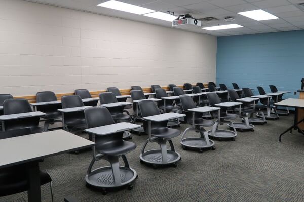 Back of room view of student tablet arm seating 