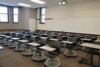 Back of room view of student tablet arm seating 