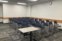 Back of room view of student tablet arm seating 