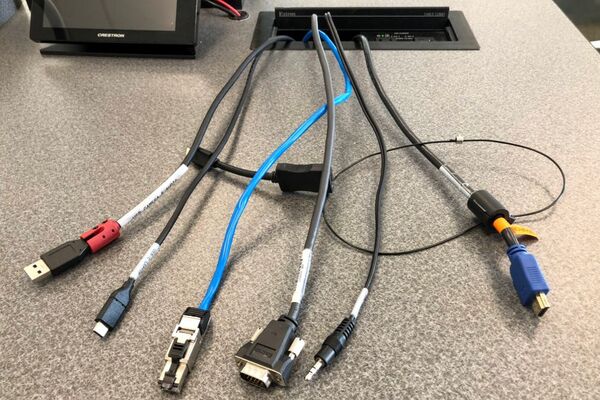 Pedestal - laptop cable connections with cables pulled out showing cable ends