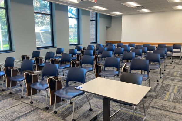 Back of room view of student tablet arm seating 