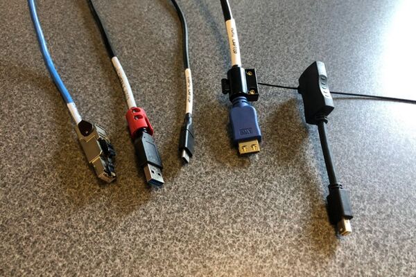 Pedestal - laptop cable connections with cables pulled out showing cable ends