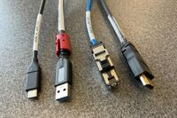 Pedestal - laptop cable connections with cables pulled out showing cable ends