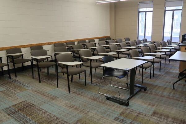 Back of room view of student tablet arm seating 