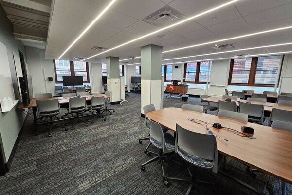 View of room with tables and chairs