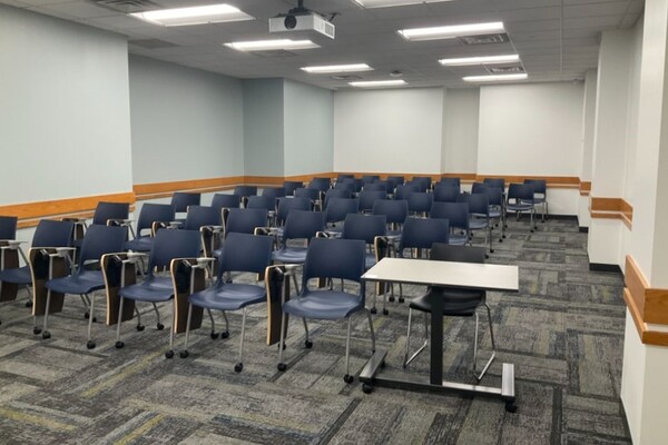 Back of room view of student tablet arm seating 