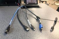 Pedestal - laptop cable connections with cables pulled out showing cable ends