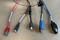 Pedestal - laptop cable connections with cables pulled out showing cable ends