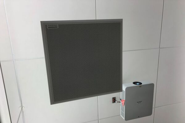 A 2¿ x 2¿ tile mounted to the ceiling to provide microphone coverage over student seating