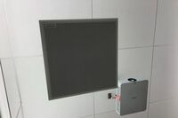 A 2¿ x 2¿ tile mounted to the ceiling to provide microphone coverage over student seating