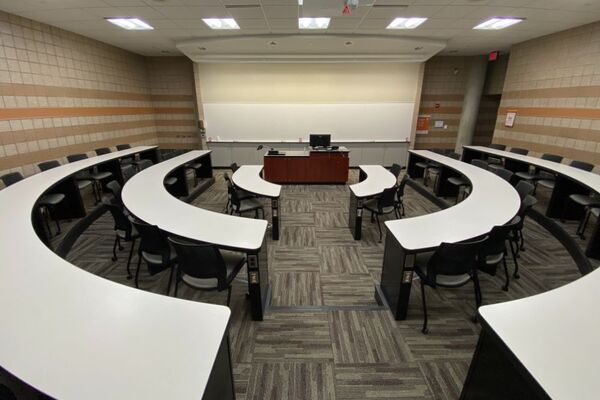 Front of room view with lectern center in front of markerboard 