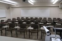 Back of room view of student tablet arm seating 