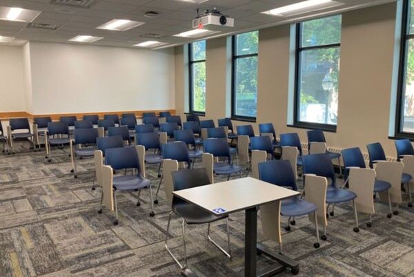 Back of room view of student tablet arm seating 