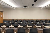 Back of room view of student tablet arm seating 