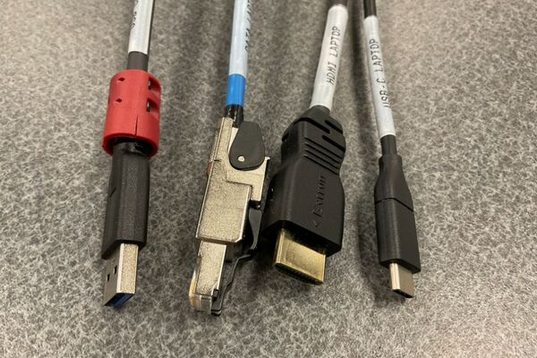 Pedestal - laptop cable connections with cables pulled out showing cable ends