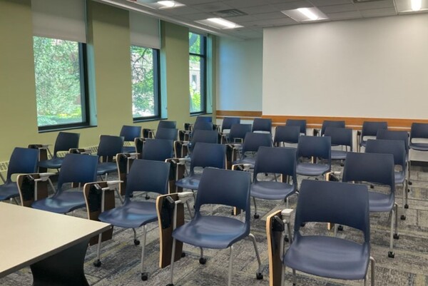 Back of room view of student tablet arm seating 