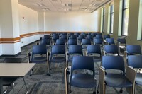 Back of room view of student tablet arm seating 