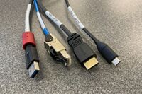 Pedestal - laptop cable connections with cables pulled out showing cable ends