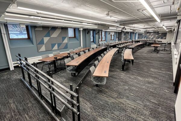 Back of room view of tables and chairs