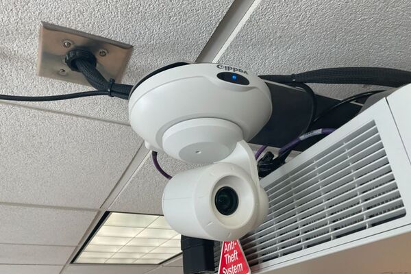 Camera mounted to ceiling and instructor enabled adjustments to the lens to allow the instructor to be "seen" by the camera in more locations around the room